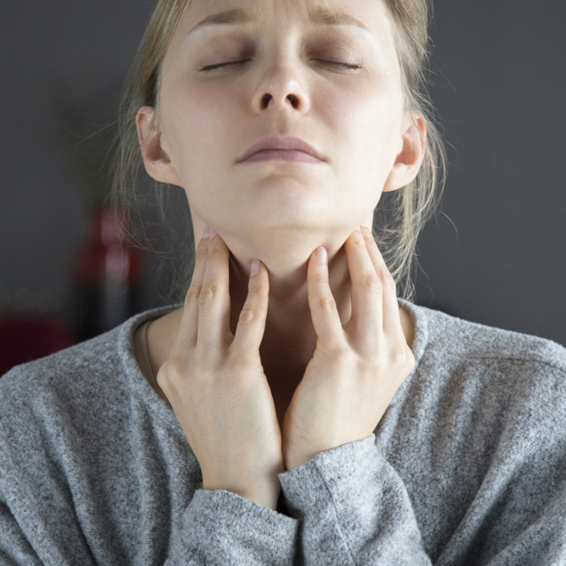 Sick Woman With Closed Eyes Having Sore Throat Touching Neck